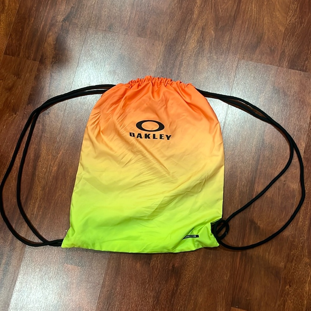 orange yellow and green oakley drawstring bag